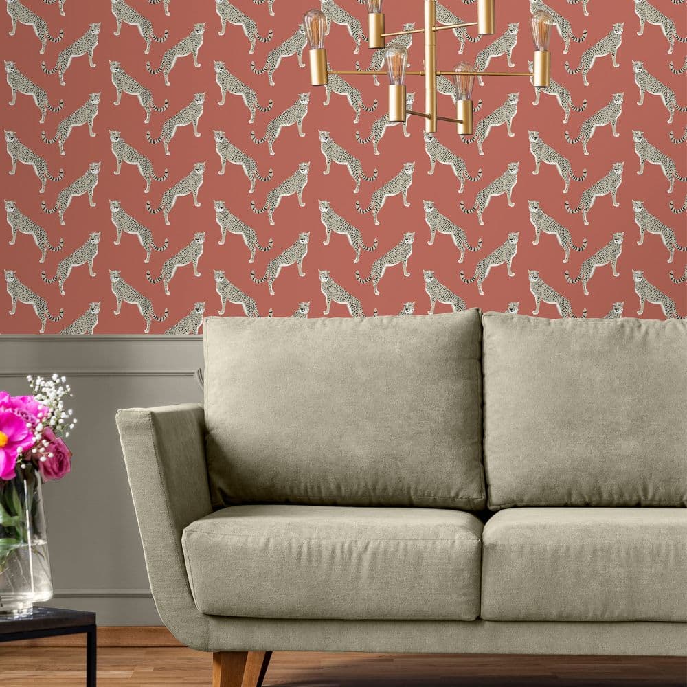 Nicole Miller Guepardo Coral Wallpaper in a living room